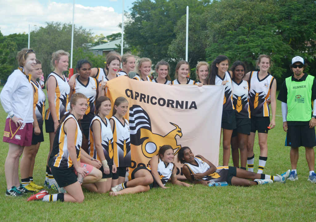 GIRLS RULE: The Capricornia under 16 girls Aussie Rules team celebrates a successful carnival at Everton Park recently. GIRLS RULE: The Capricornia under 16 girls Aussie Rules team celebrates a successful carnival at Everton Park recently.